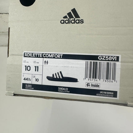 adidas Unisex Adilette Comfort Slides Sandal, Core Black/White, 11 Women/10 Men