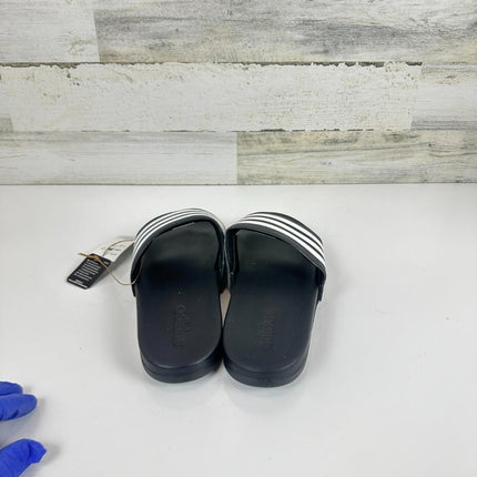 adidas Unisex Adilette Comfort Slides Sandal, Core Black/White, 11 Women/10 Men